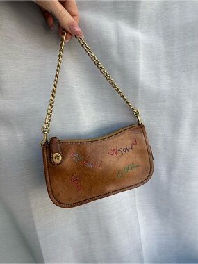 Coach embroidered swinger bag